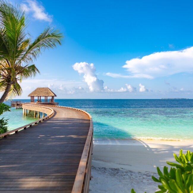 DUSIT THANI MALDIVES, MALDIVES, SEPTEMBER 24, 2017: Foot path to jetty